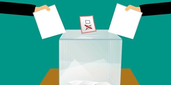 Infografía sobre dos ciudadanos depositando su voto en una urna