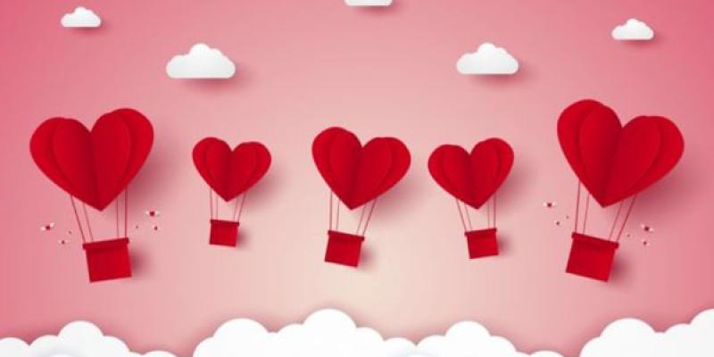 Amor San Valentín /El Imparcial de Oaxaca Corazones morados vuelan por el cielo con una tarjeta colgada mientras dejan nubes a su paso