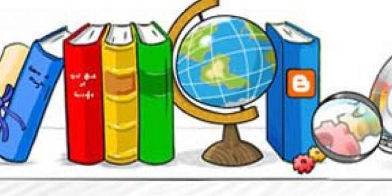 Alfabetización/ 20 Minutos Alfabetización: libros en un estante junto a una bola del mundo