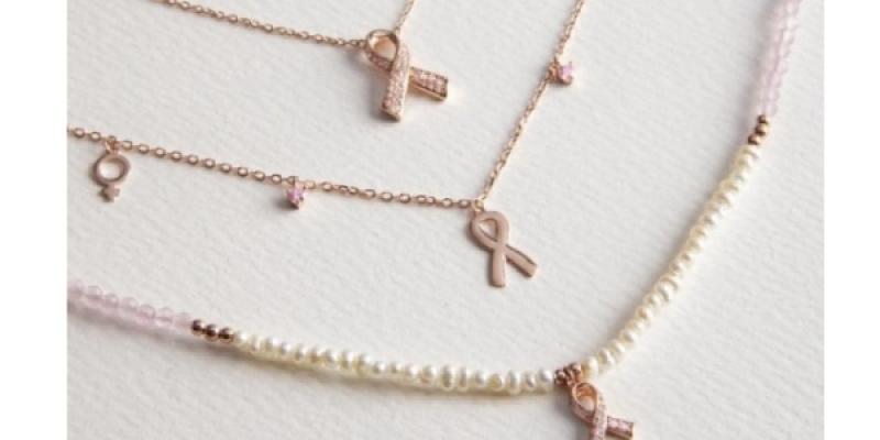 Collar solidario de la Fundación Querer y Luxenter. El cáncer de mama, refleja en un collar solidario la lucha de las que lo padecen