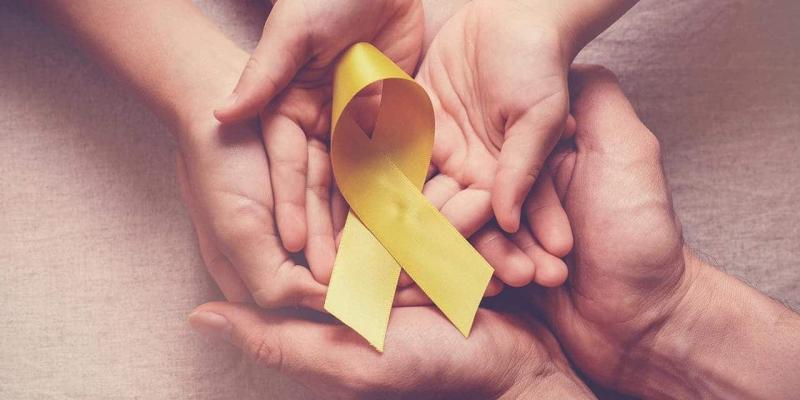 Imagen del lazo contra el cáncer infantil/Hogarmania Día Internacional del Cáncer Infantil
