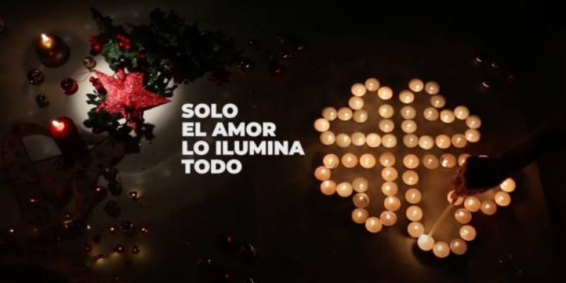 Imagen de la campaña “Sólo el amor lo ilumina todo”/COPE Cáritas invita a compartir la Navidad en familia y amor