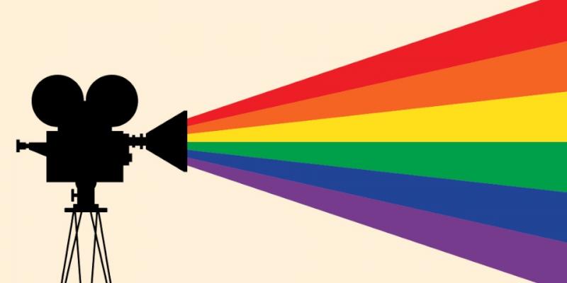 Cine LGTBI+ - Fundación Triángulo Una cámara de cine emite una bandera arcoíris