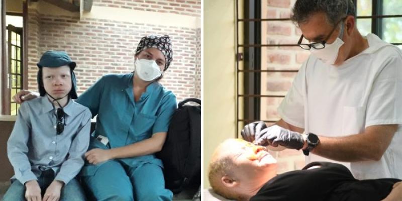 Los doctores atendiendo a albinos de Malawi | Foto de la Clínica Universidad de Navarra La doctora Alejandra Tomás y el doctor Pedro Redondo, atendiendo a personas albinas de Malawi