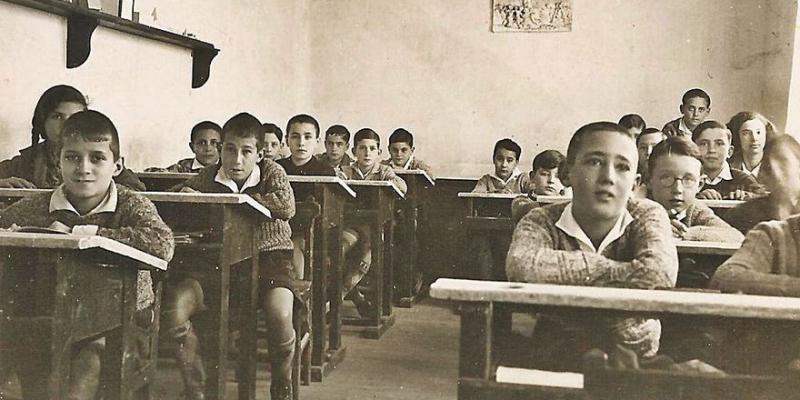 elperiodicodearagon.com Aula en un colegio en España a inicios del siglo XX.