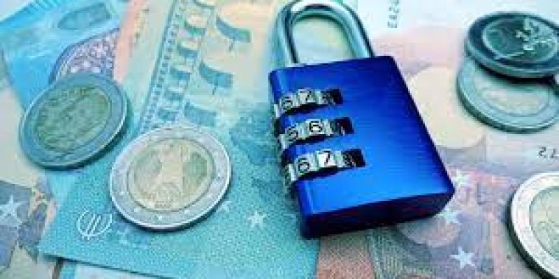 Imagen de dinero y un candado/López Cantal Abogados Claves para entender el patrimonio protegido de las personas con discapacidad