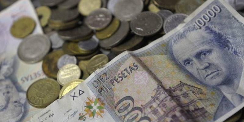 Vender pesetas Monedas y billetes de las antiguas pesetas. / AFP
