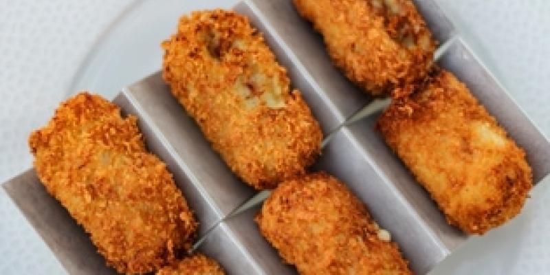 Imagen de unas croquetas/envatoelements Platos tradicionales más demandados en los pedidos a domicilio