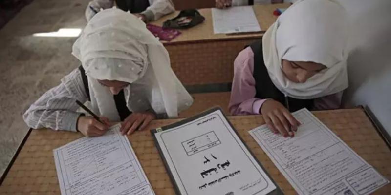 Yemeni students take the final school exam a month earlier as a precautionary measure against the wide spread of Coronavirus, at a school in Sanaa. 