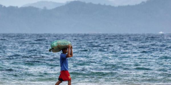 El calentamiento de los océanos amenaza la seguridad alimentaria y el sustento humano. Foto de Jiang Zhu