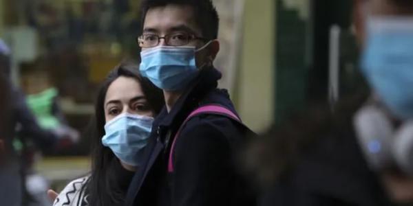 Personas con mascarillas en Melbourne, donde las autoridades han decretado una semana de confinamiento